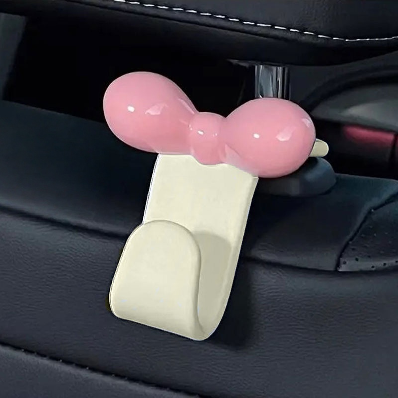 Travel Accessories Deals - Minimalistische Schleifenhaken für den Rücksitz im